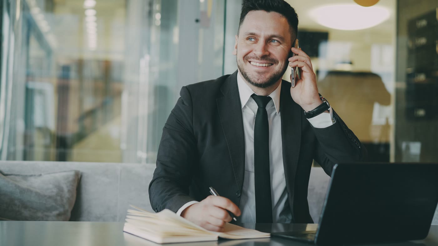 Allied Compliance Group team member on a call with a client